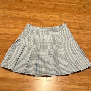 Blue and white checkered skirt. Never worn out. Only ever tried on.